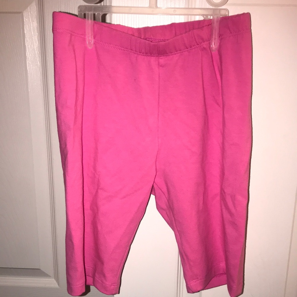 Brand new pink biker shorts. Size L, 10/12. 95% cotton, 5% spandex.